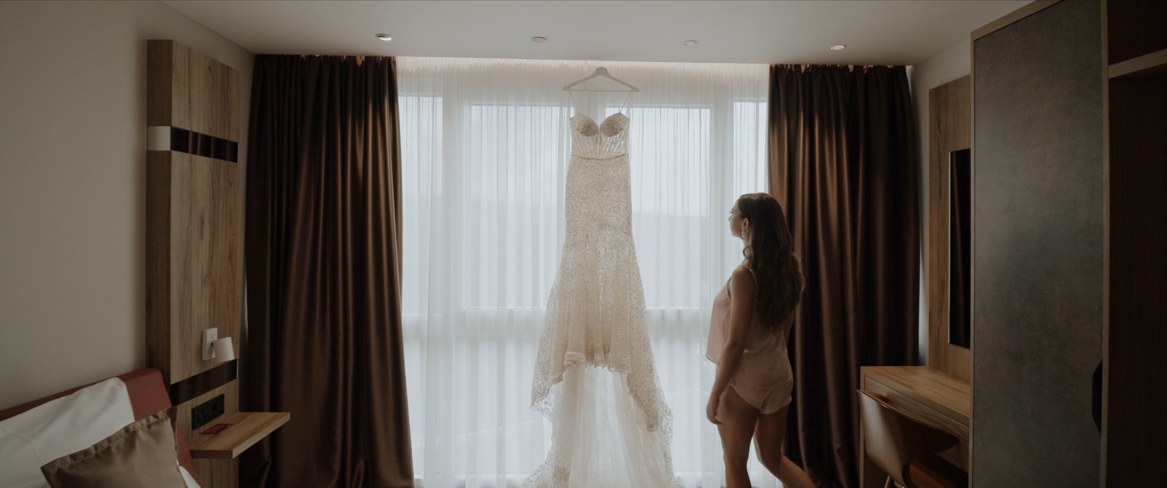 Ivana during wedding preparations beside her dress at Vrdnička Kula