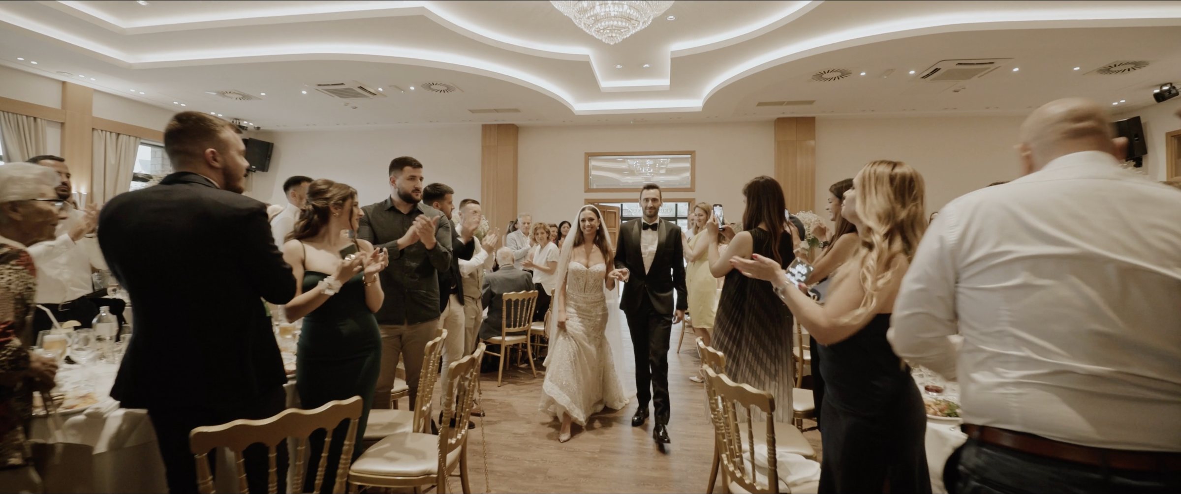 Ivana and Slobodan entering their wedding celebration at Vrdnička Kula
